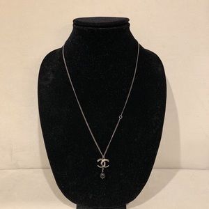 Chanel necklace.
